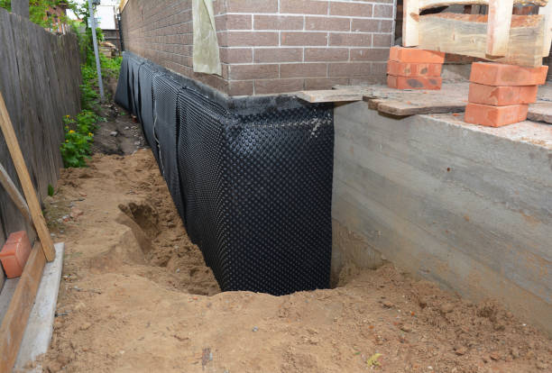 Happy homeowners after waterproofing job in Lakeside